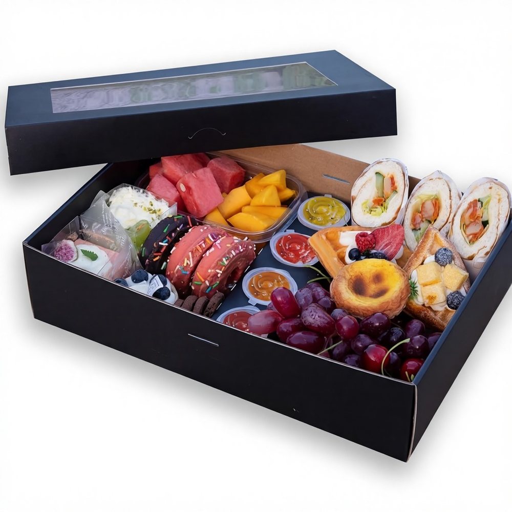 Black picnic box with food platter