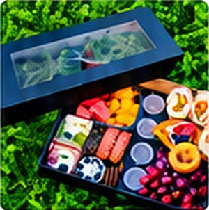 Dark window box with a food assortment